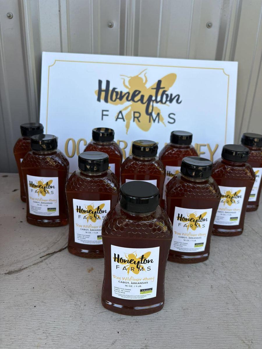 Bottles of local raw wildflower honey from Honeyton Farms